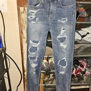 Woman's Distressed American Eagle Blue Jeans